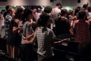 people praying together Make Church Announcements Engaging